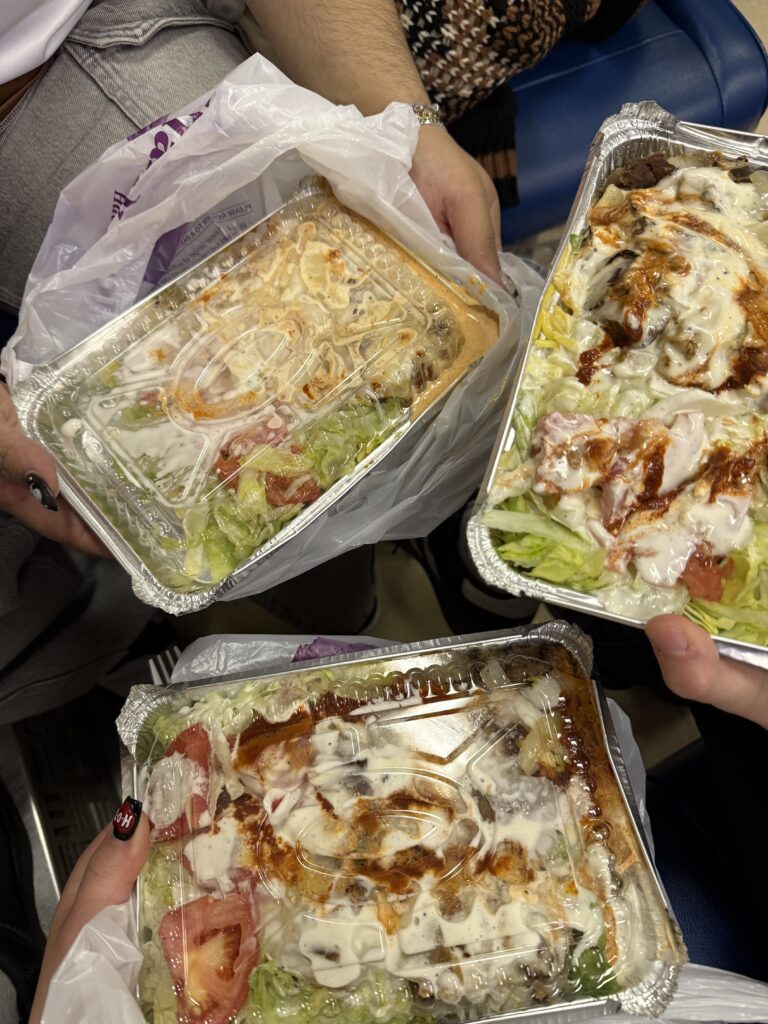 3 trays of chicken and lamb over rice