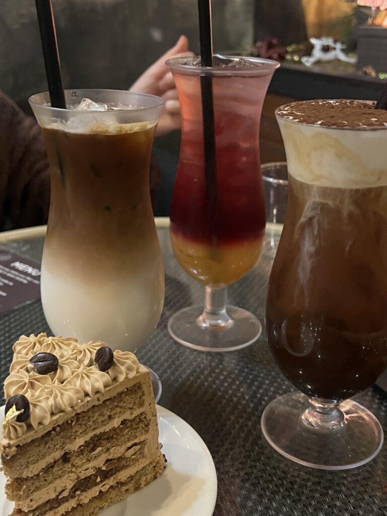 3 drinks next to each other with coffee cake slice