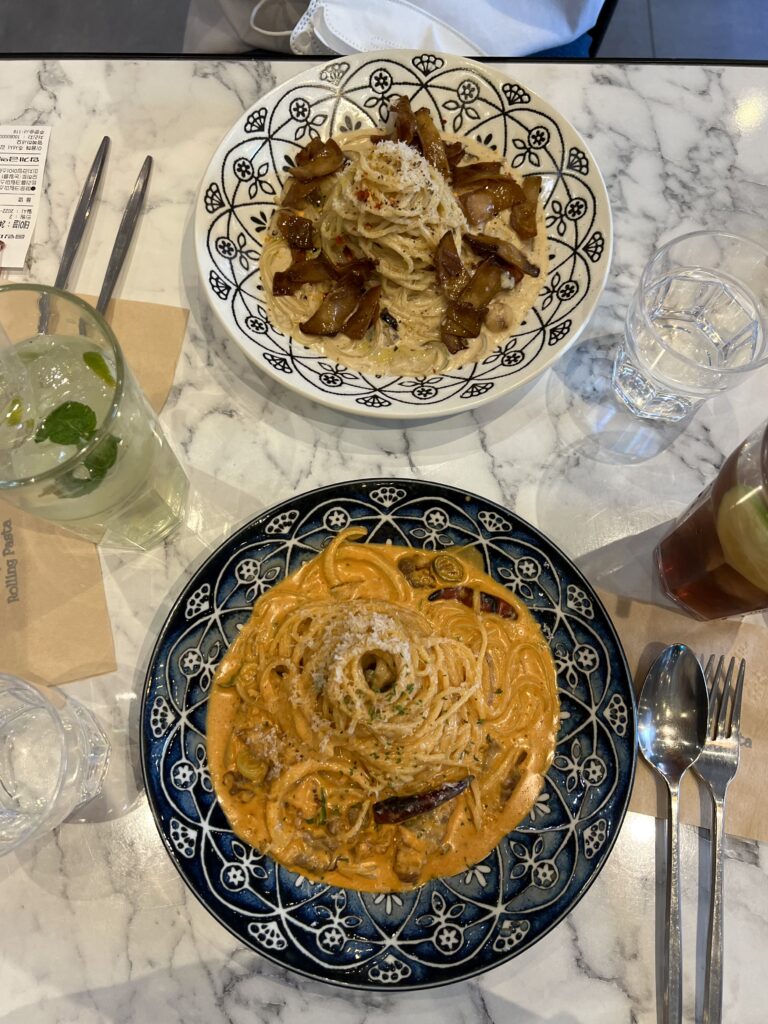 2 plates of pasta on elegant plates